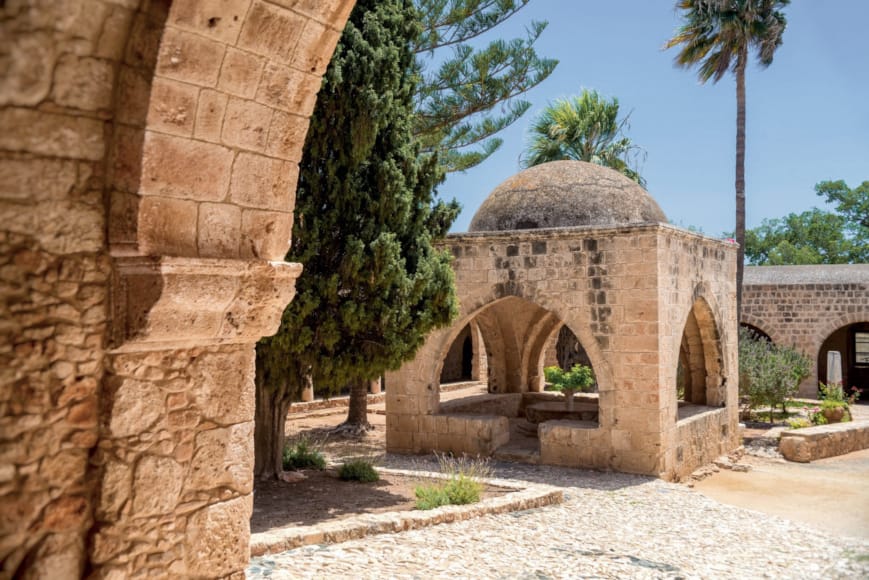 a stone archway with a dome