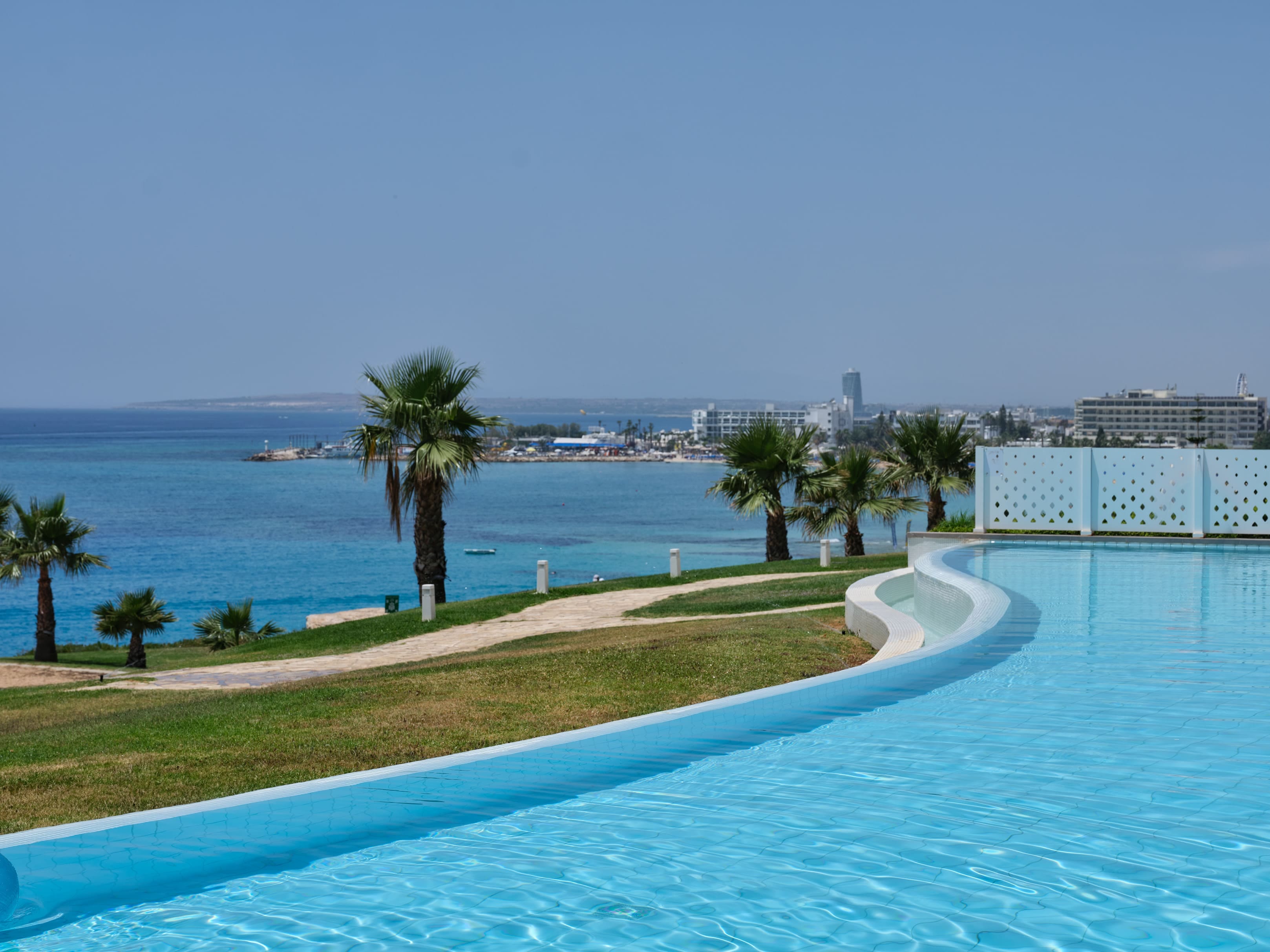 a pool next to a beach
