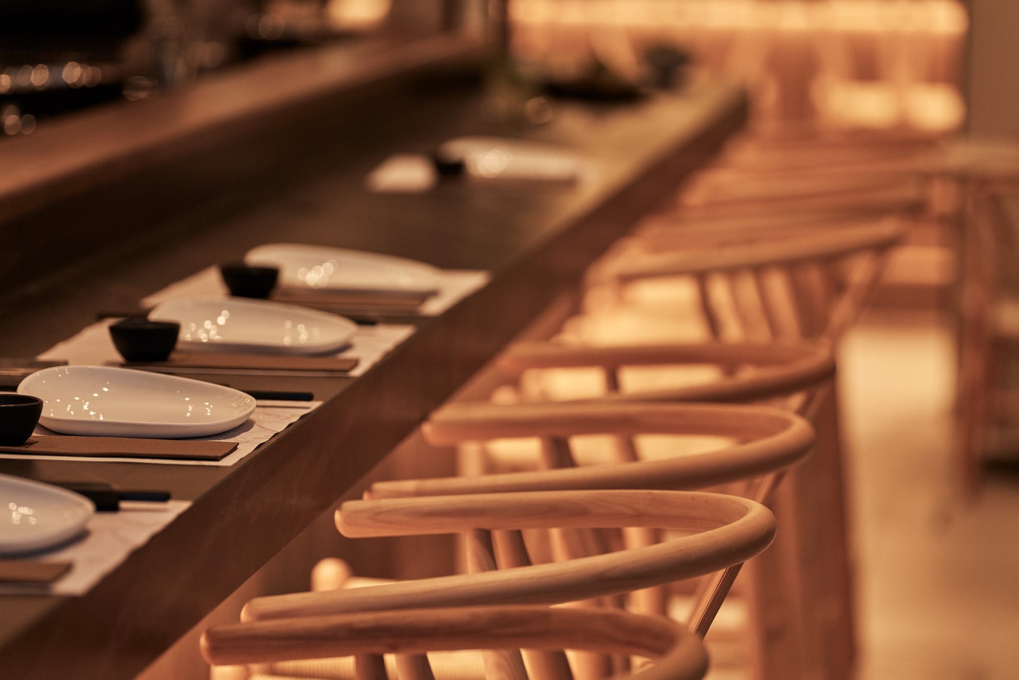 a wooden table with plates on it