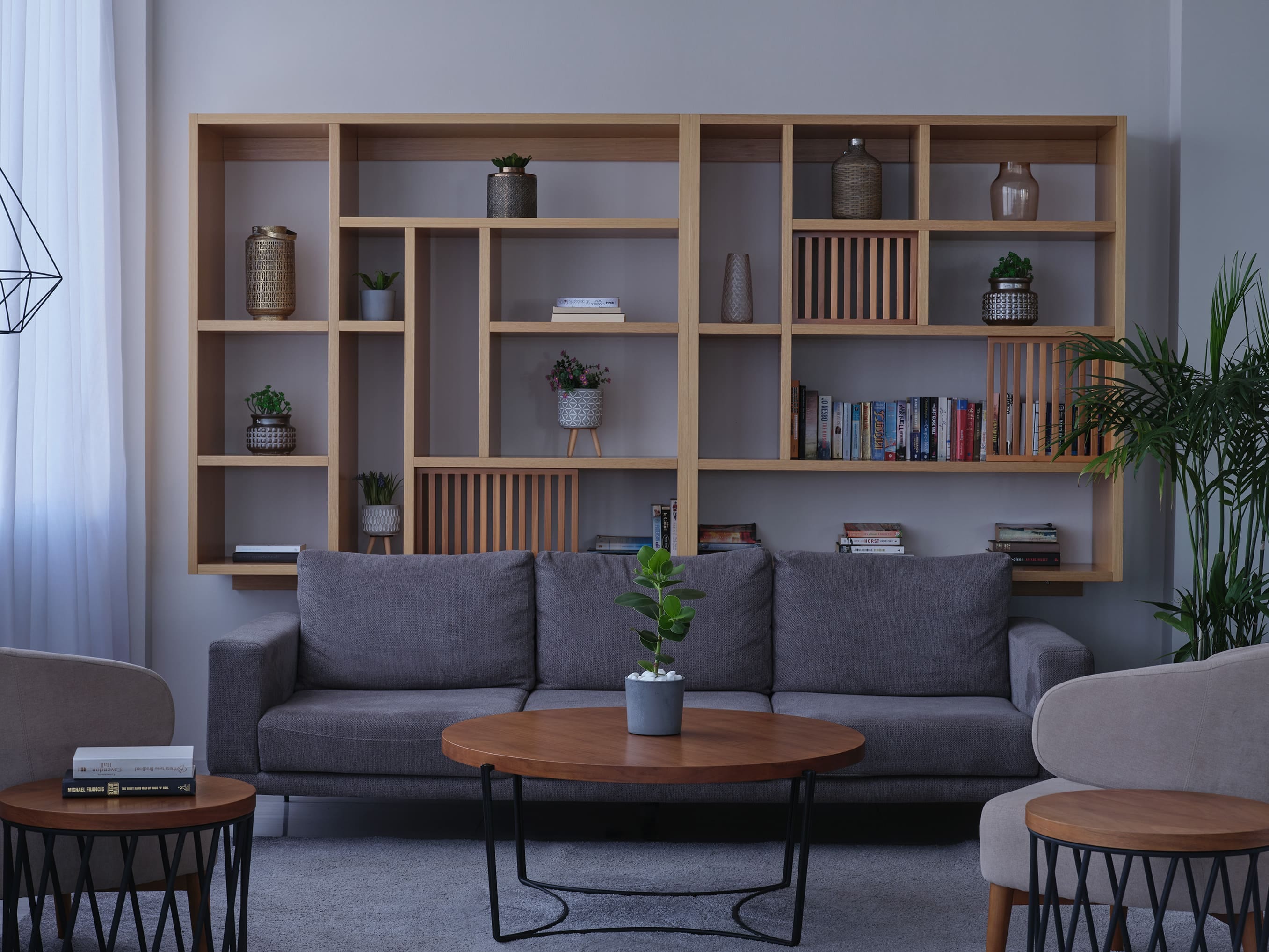 a room with a couch and shelves