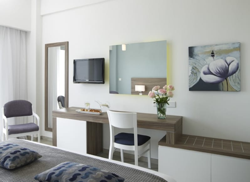 a room with a table and chairs