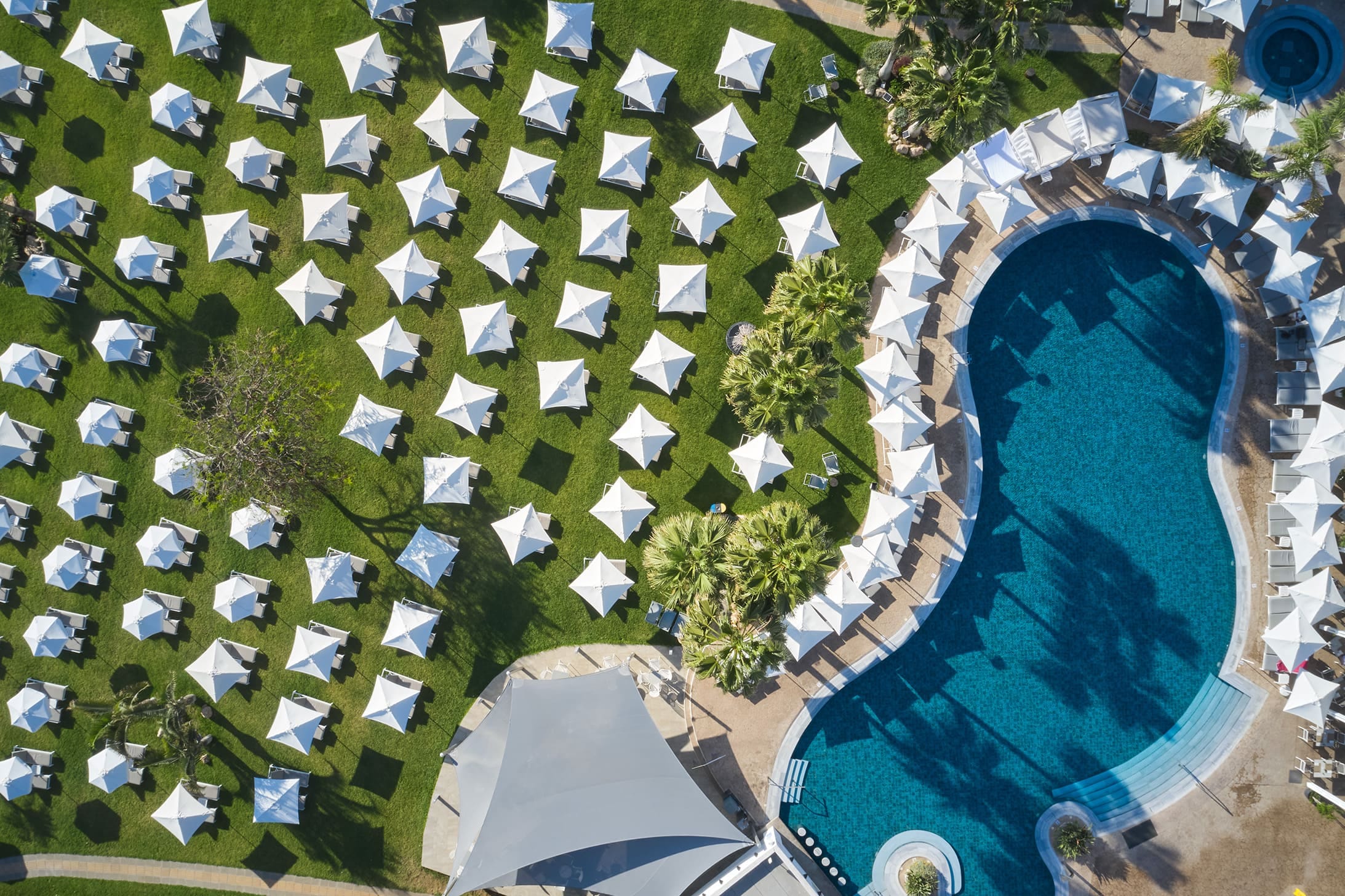 a blue car parked in a field