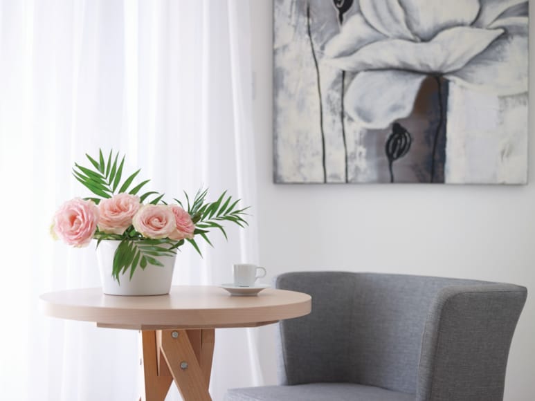 a table with a vase of flowers