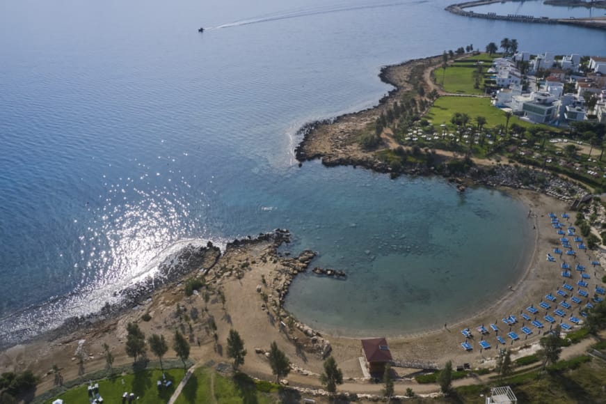 a beach with a body of water