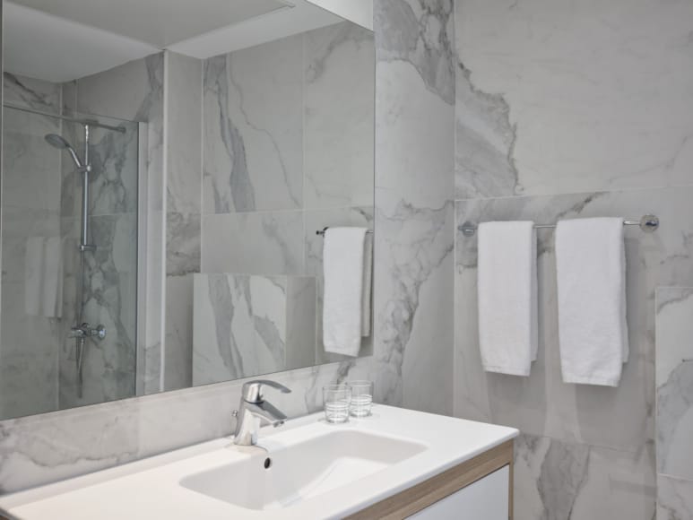 a bathroom with a glass shower