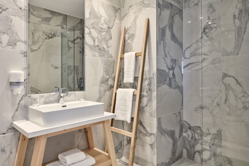 a bathroom with a sink and a mirror