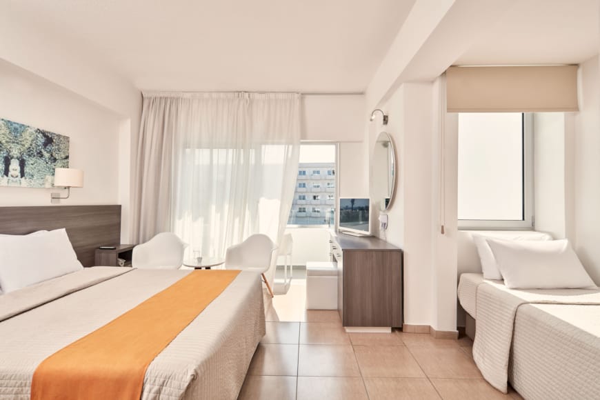 a room with a bed and a couch