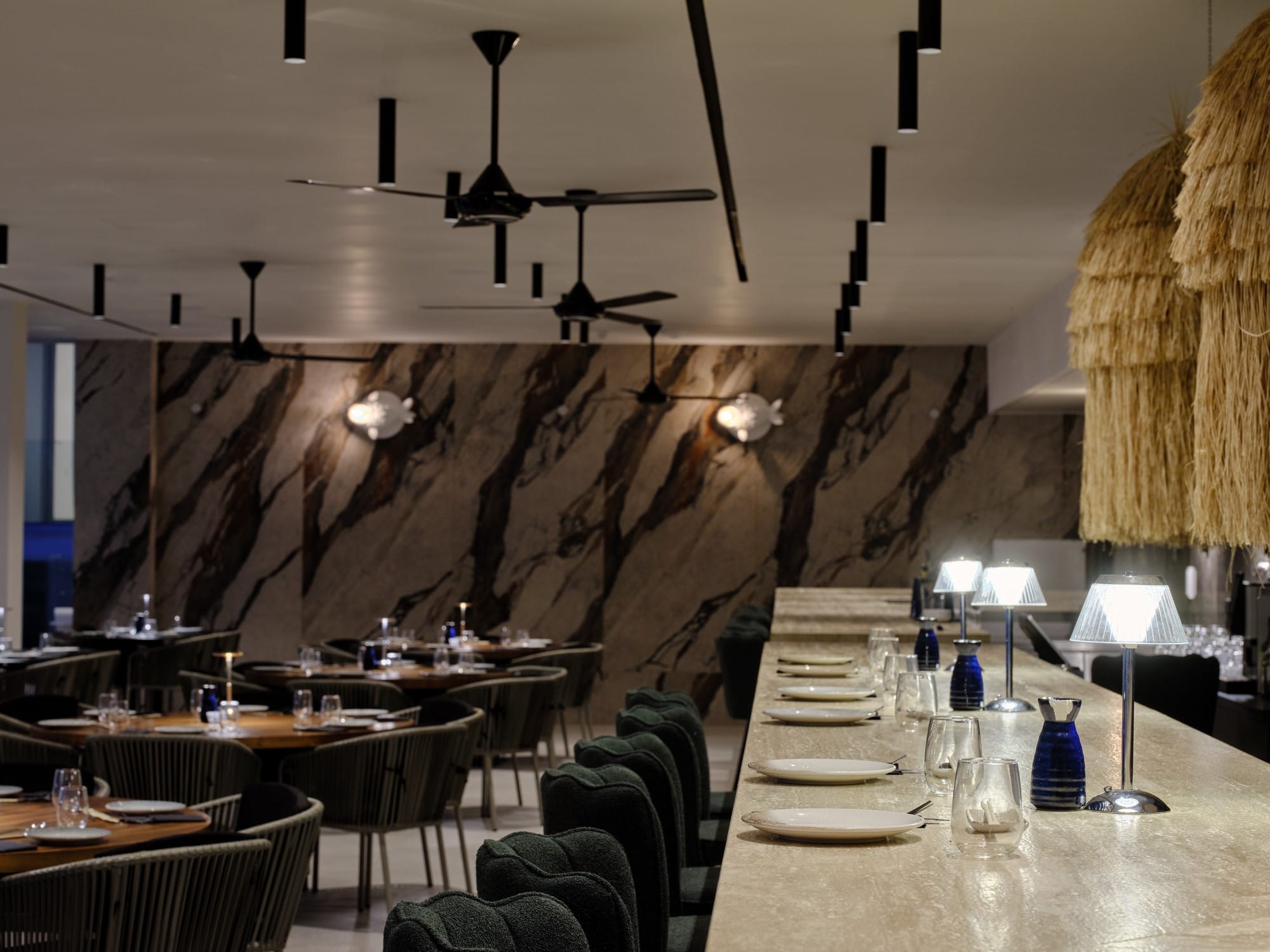 a restaurant with tables and chairs