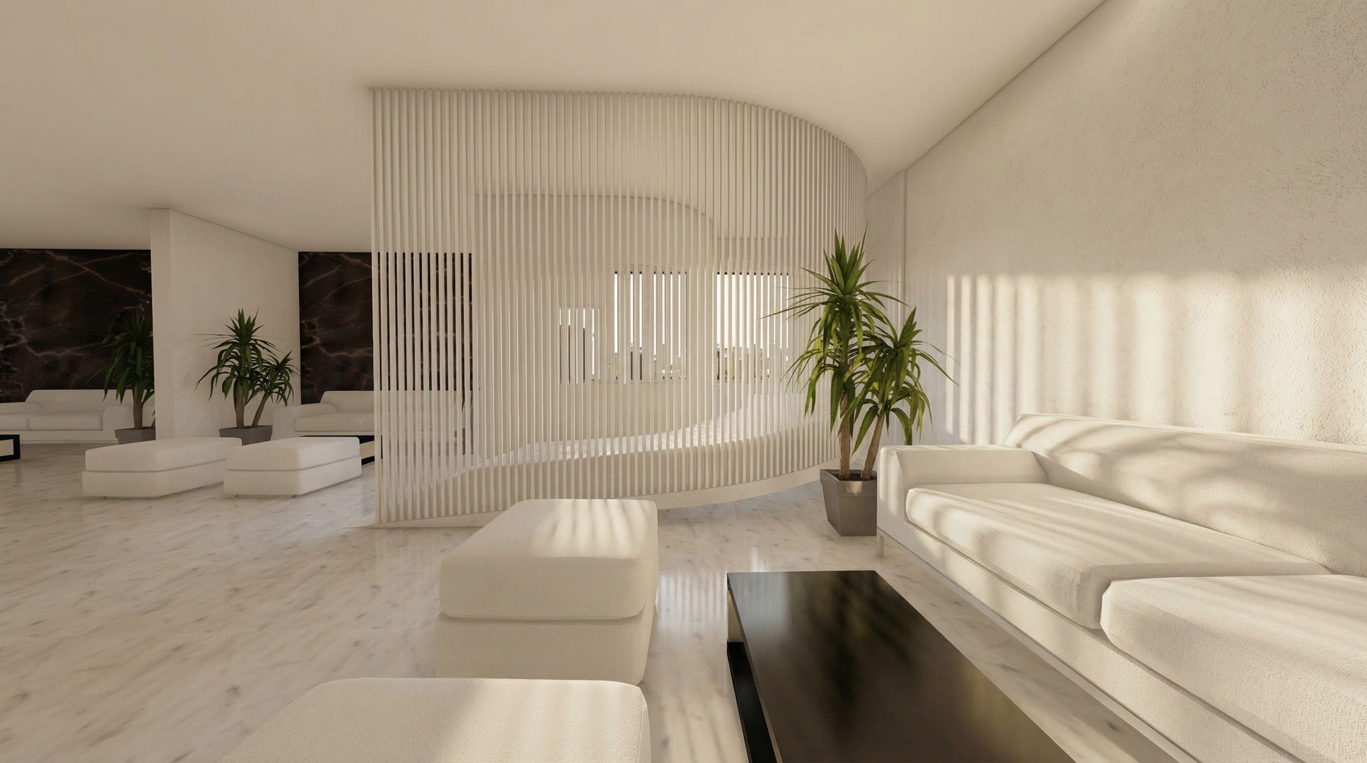 a room with white couches and a table