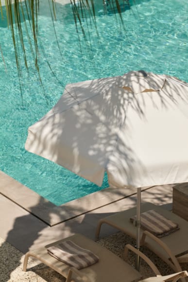 a white tent on a beach