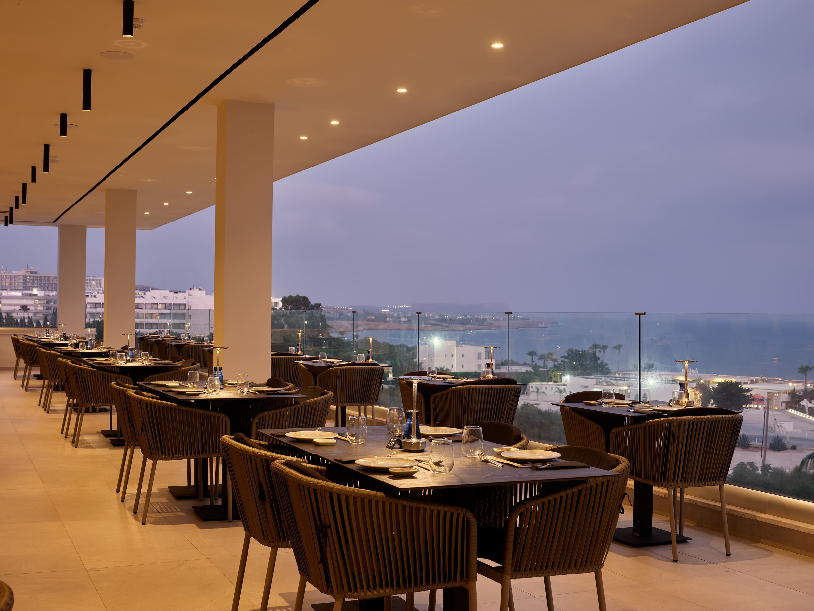 a restaurant with tables and chairs