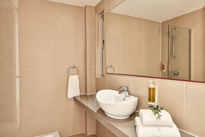 a bathroom with a large mirror