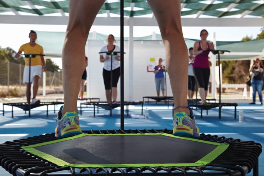 a woman doing a high jump