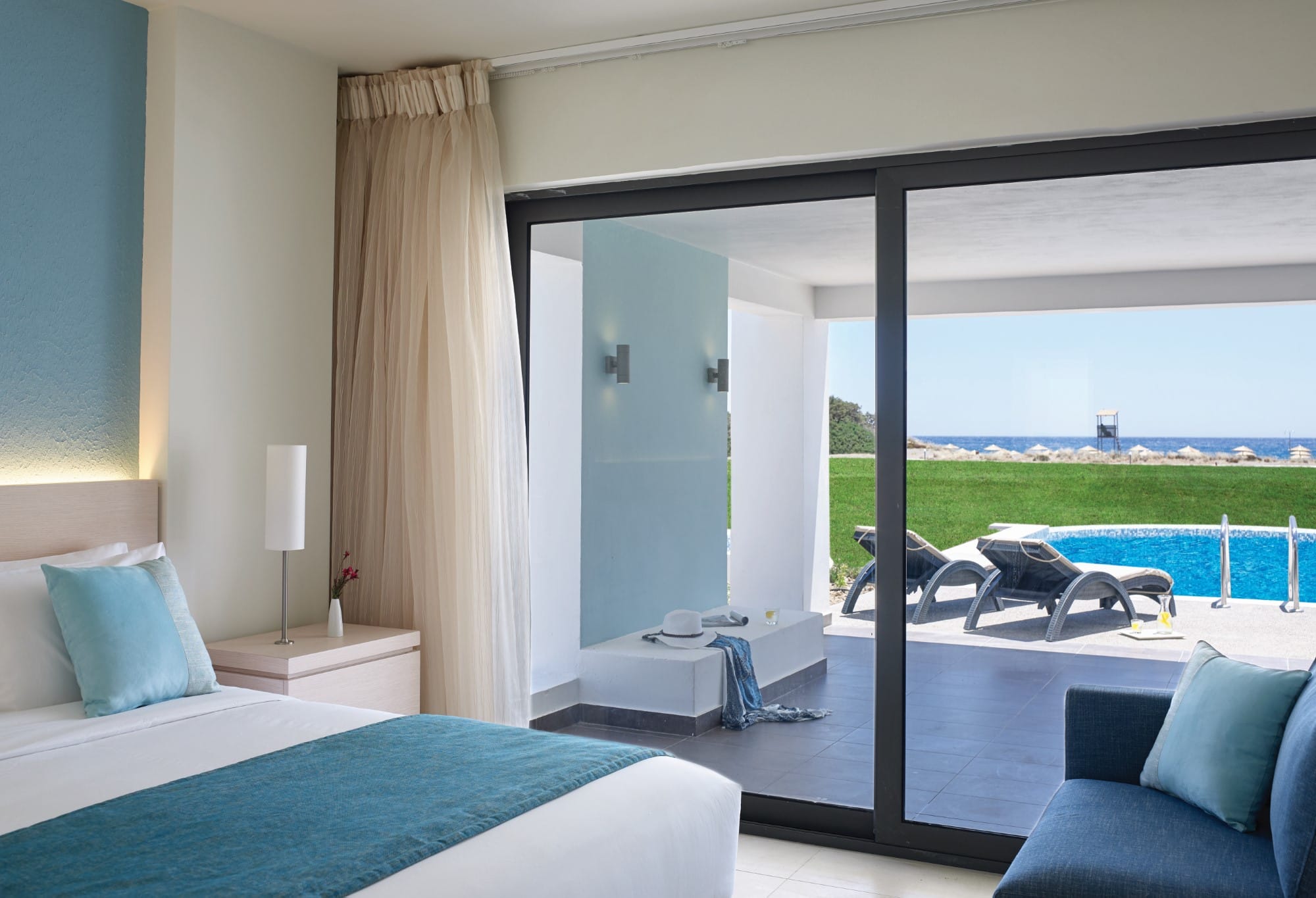 a bedroom with a large window