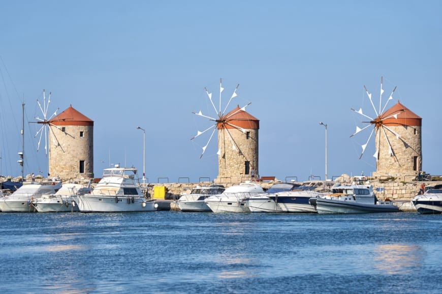 a group of boats in a harbor
