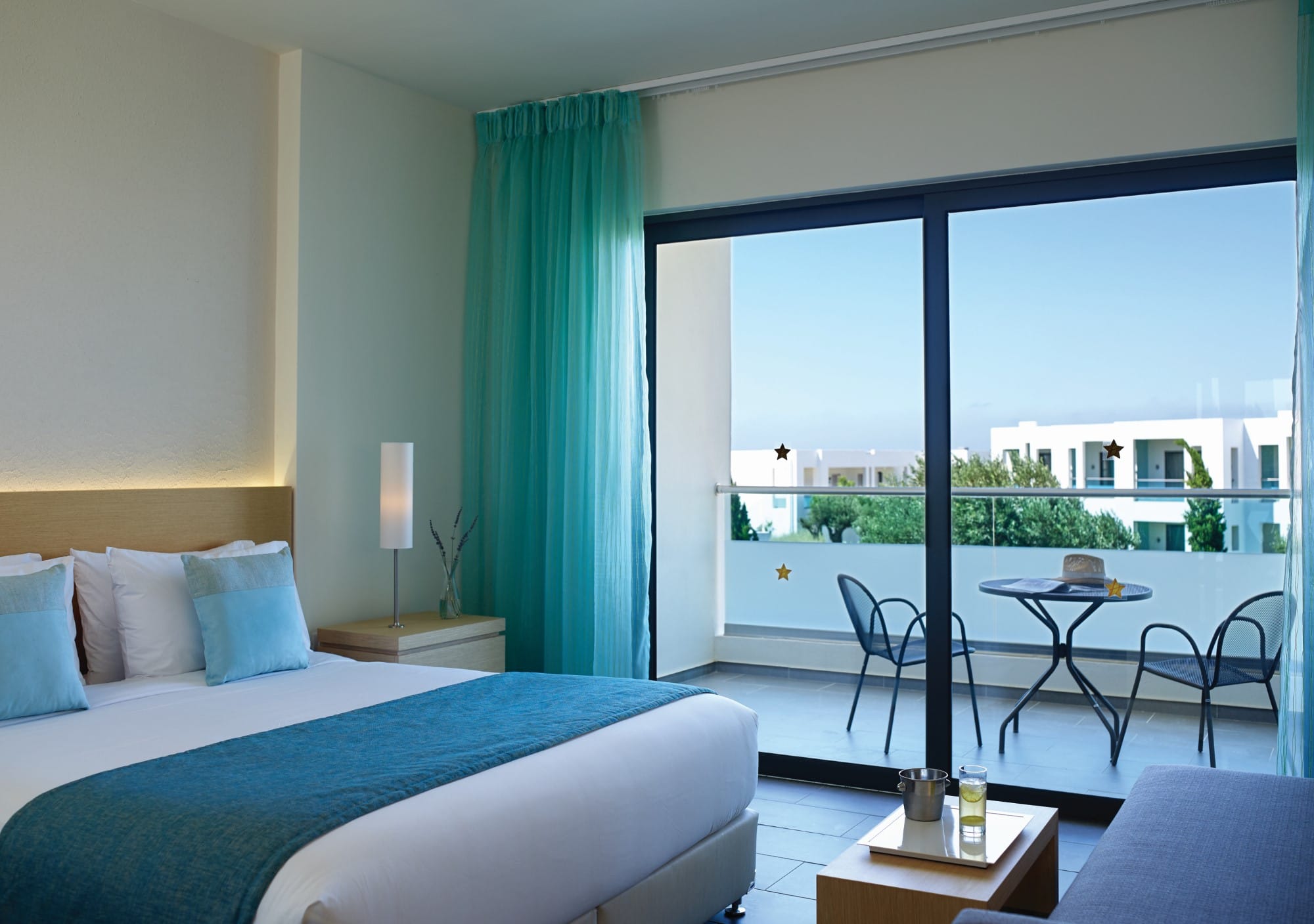 a bedroom with a large window