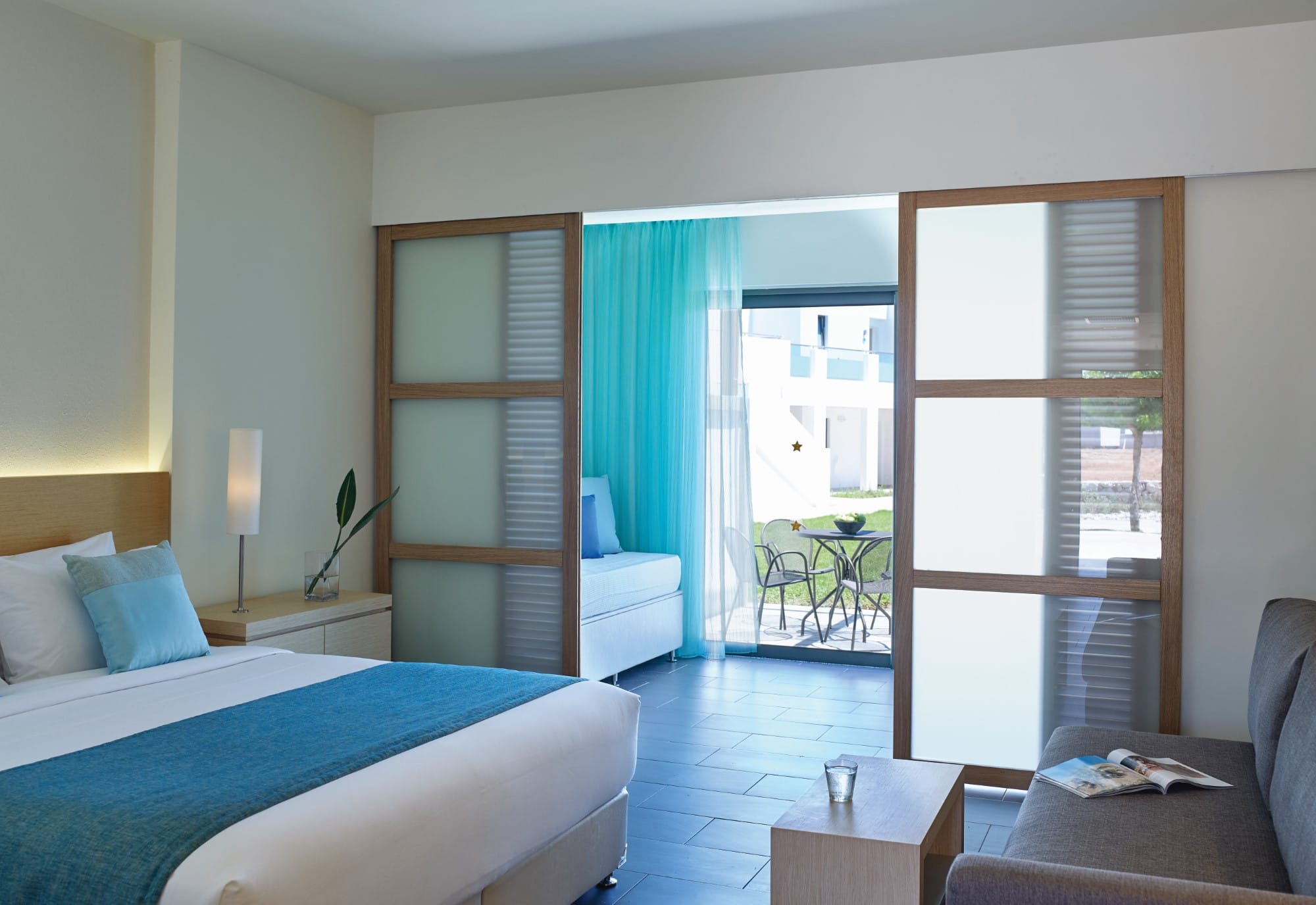 a living room with a large glass door