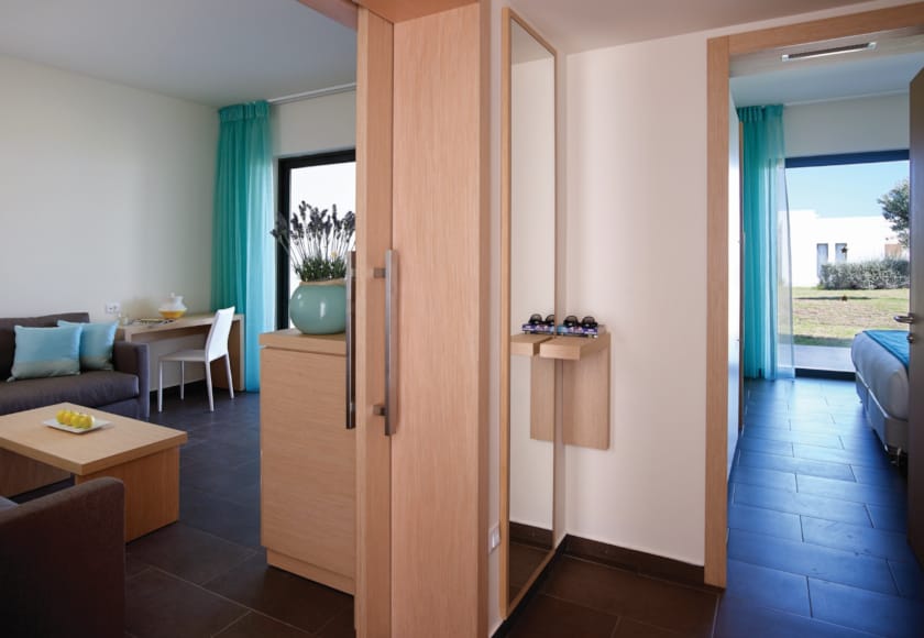 a room with a table and chairs
