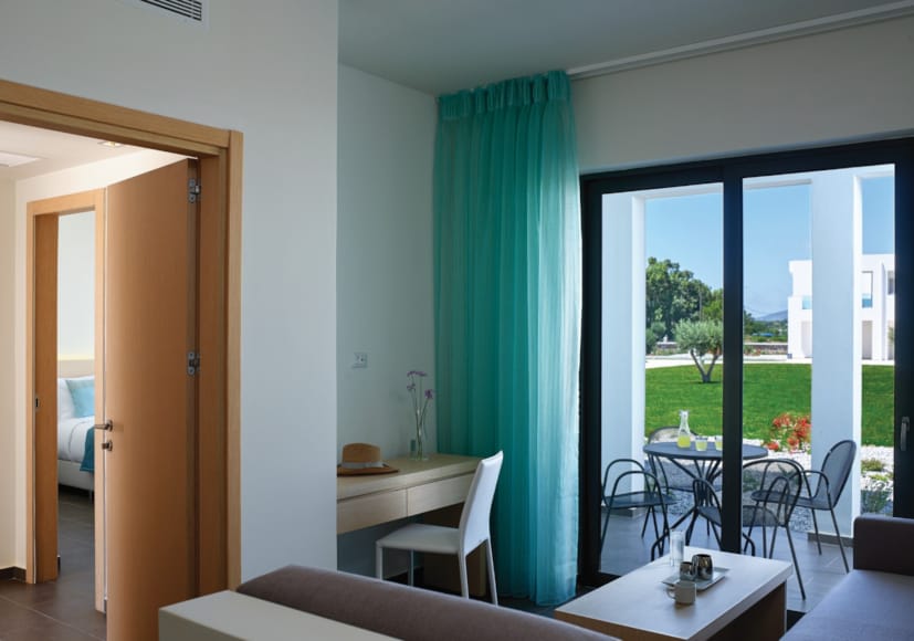 a room with a table and chairs