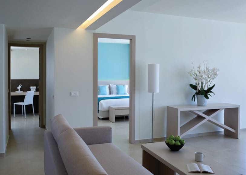 a living room with a couch and a table