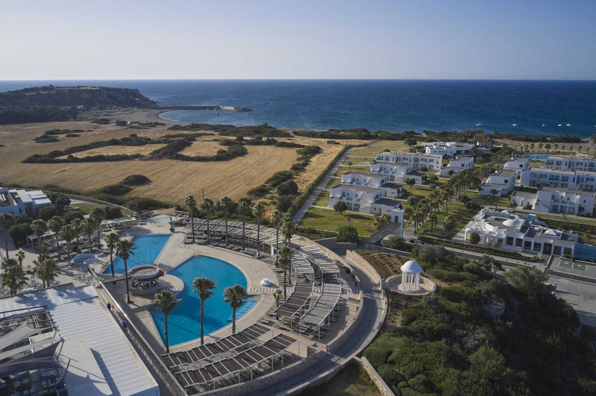 a pool next to a beach