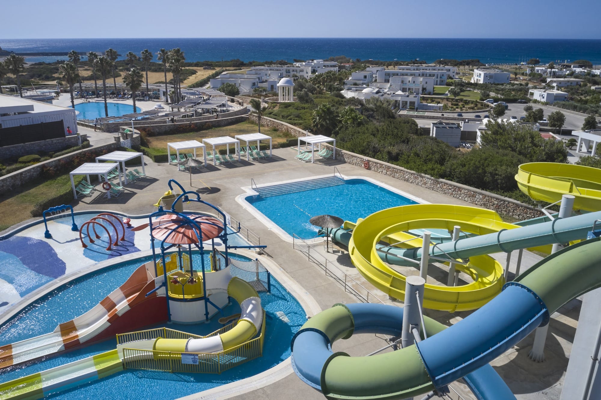 a swimming pool with a slide