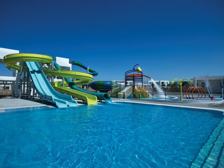 a swimming pool with a slide