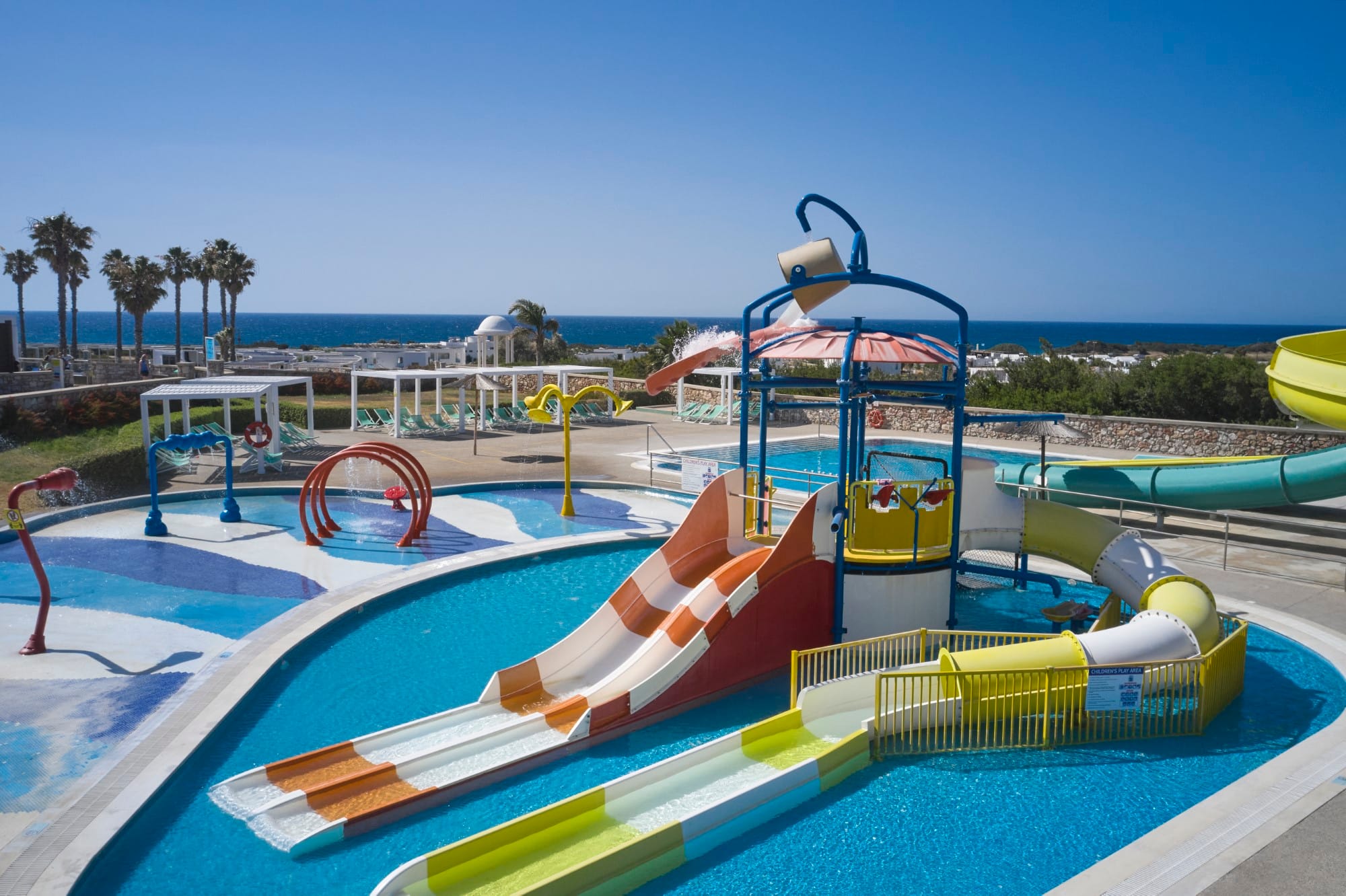 a swimming pool with a slide