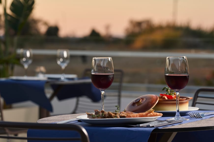 a table with glasses of wine
