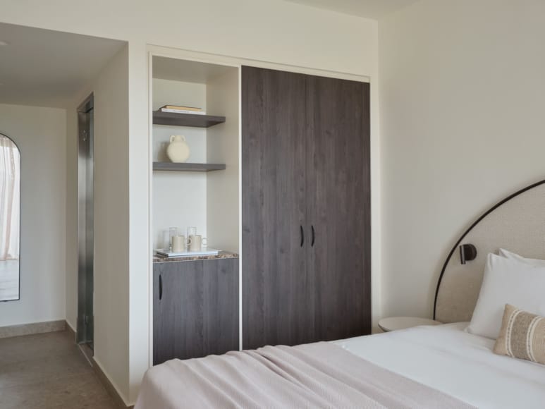 a bedroom with a closet