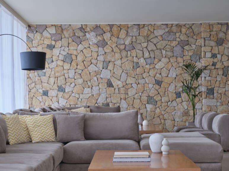 a couch with a table and a lamp