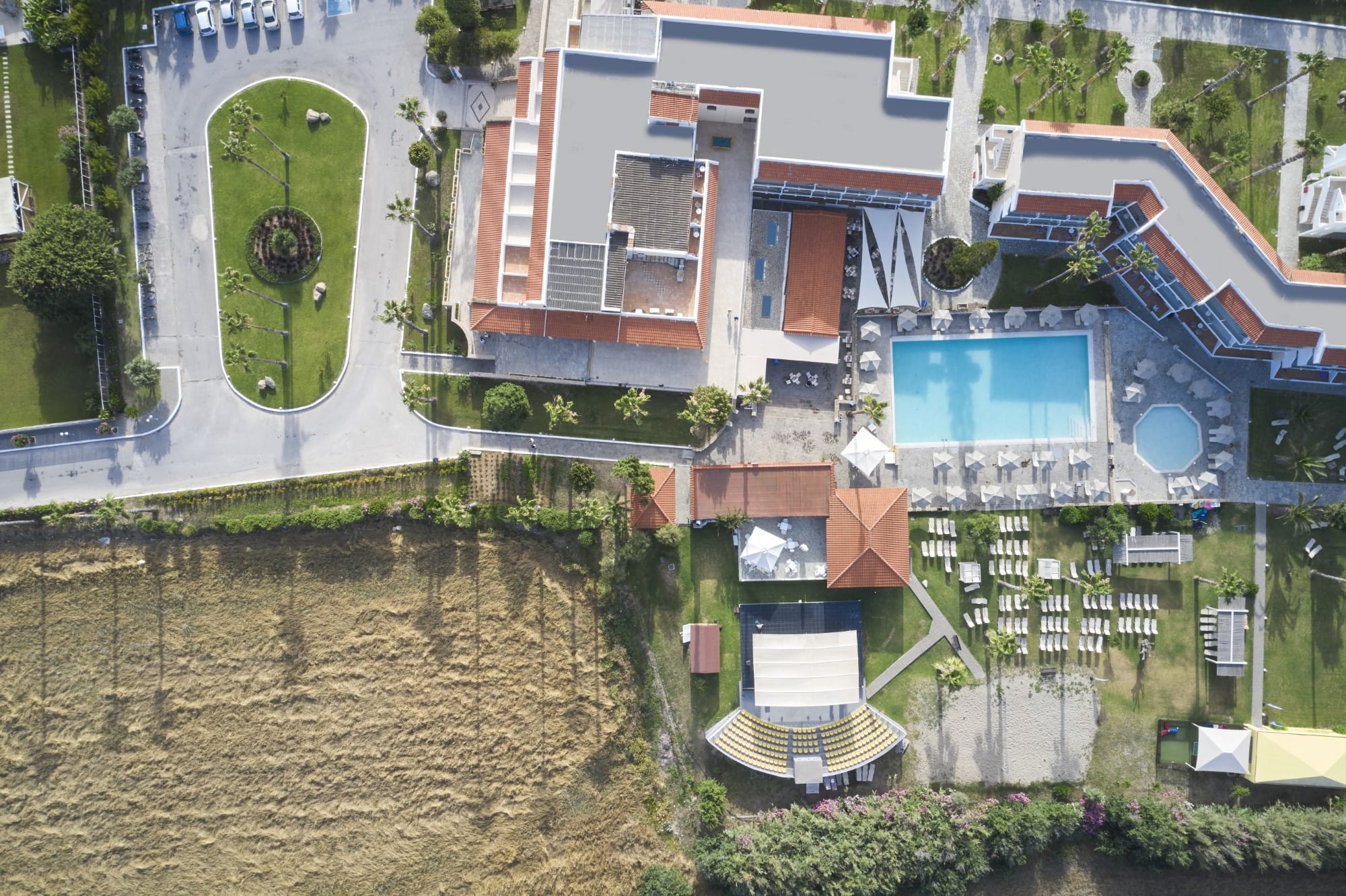 a flooded street with a clock tower
