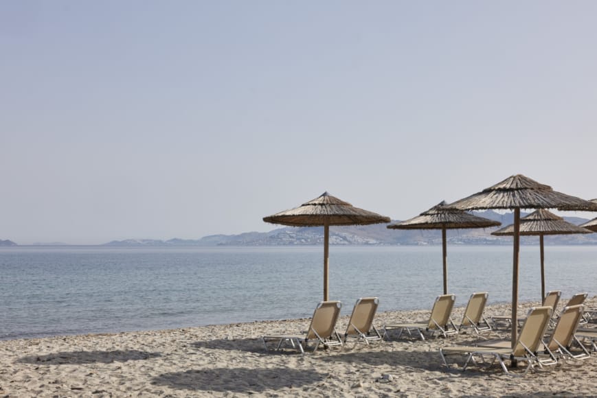 chairs and umbrellas on a beach