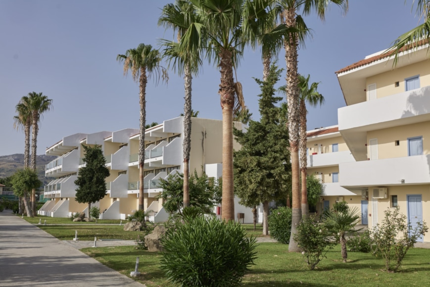 a building with palm trees