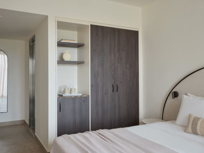 a bedroom with a closet