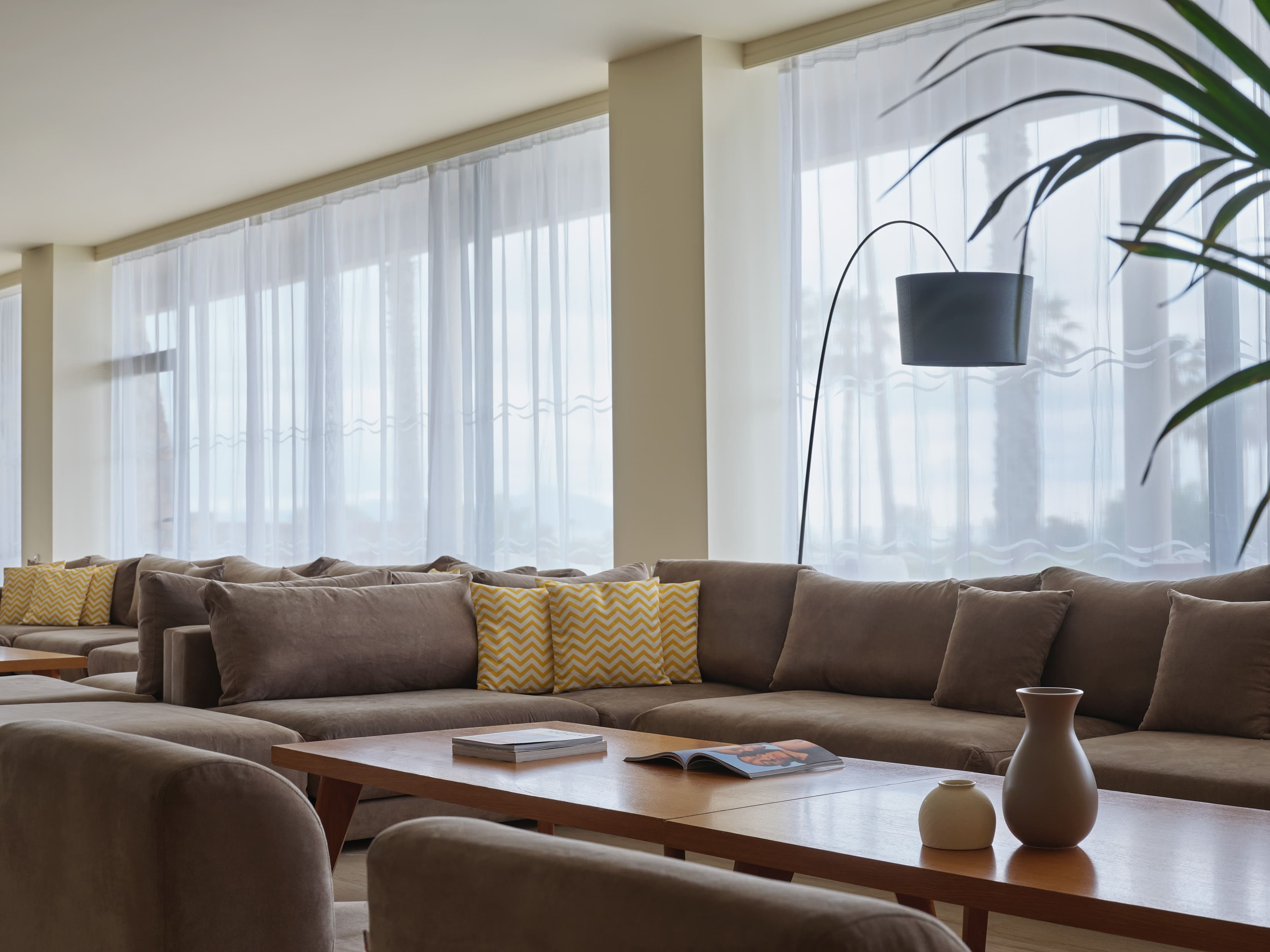 a living room with a couch and coffee table