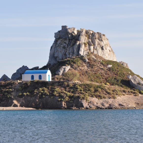 a house on a rocky island