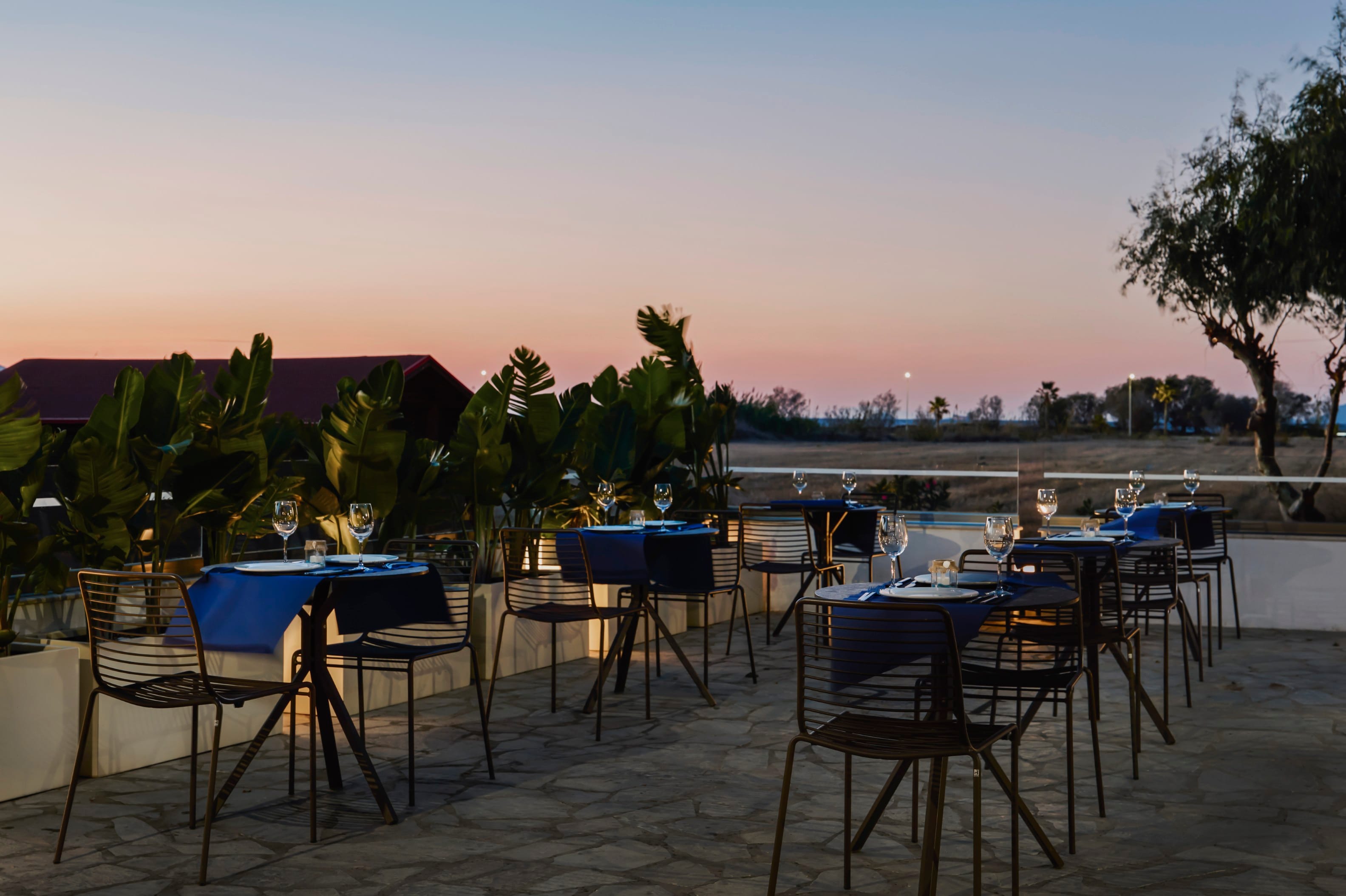 tables and chairs on a deck