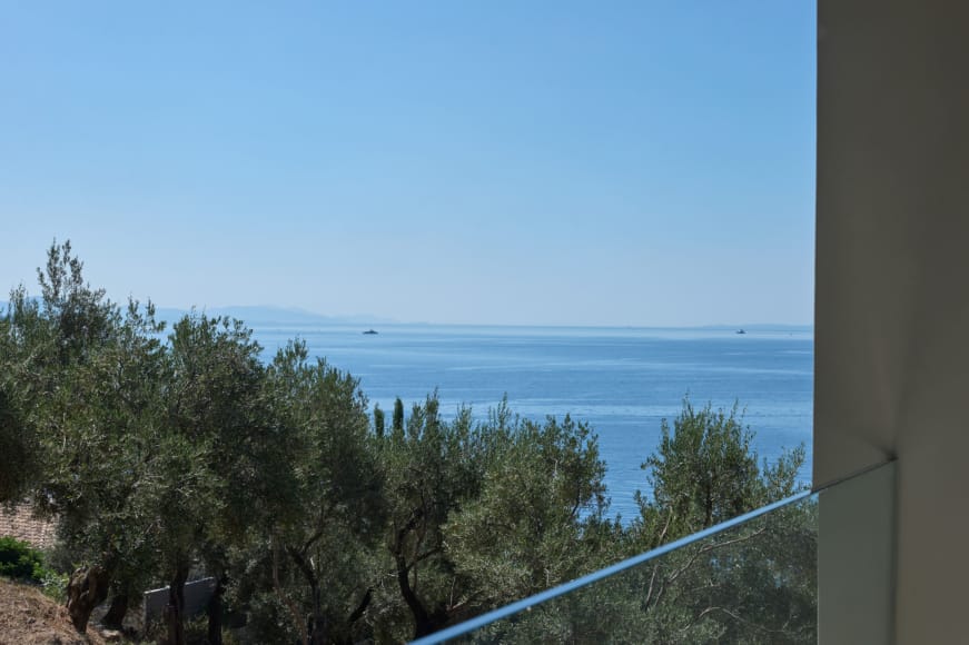 a view of the ocean from a balcony