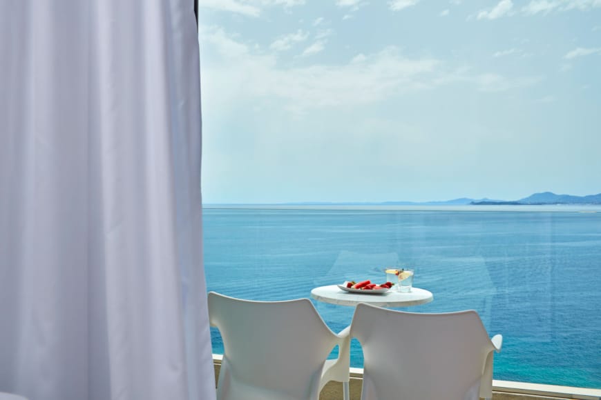 a table and chairs on a boat