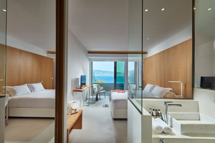 a modern bedroom with a large glass door