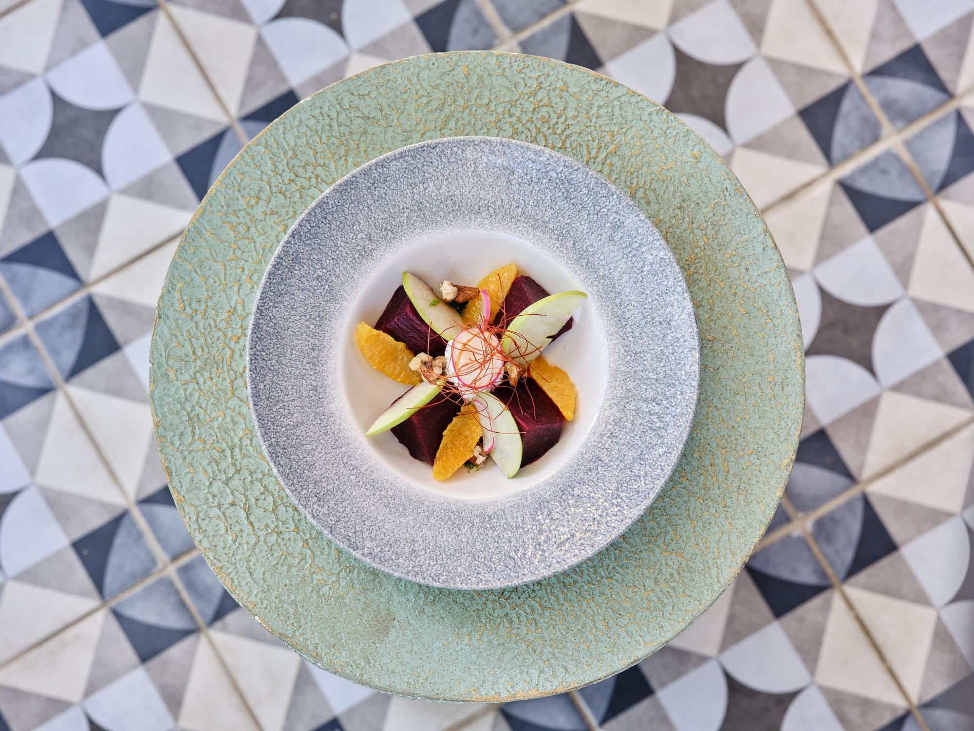 a cup with a flower in it