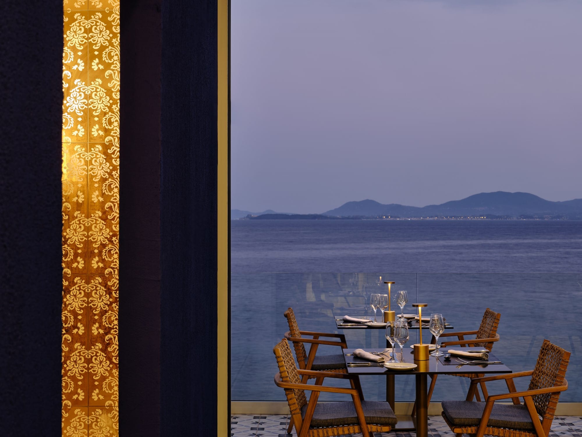 a table and chairs by a window
