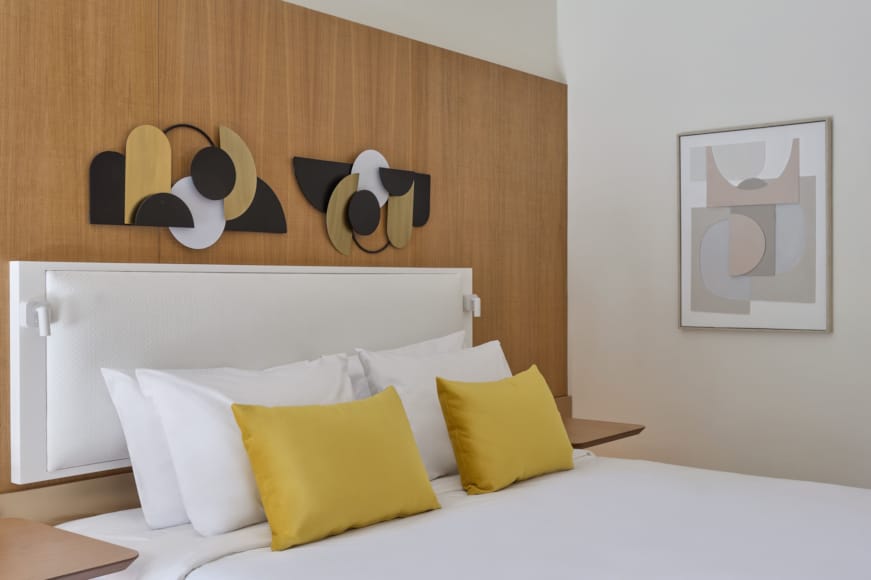 a bed with pillows