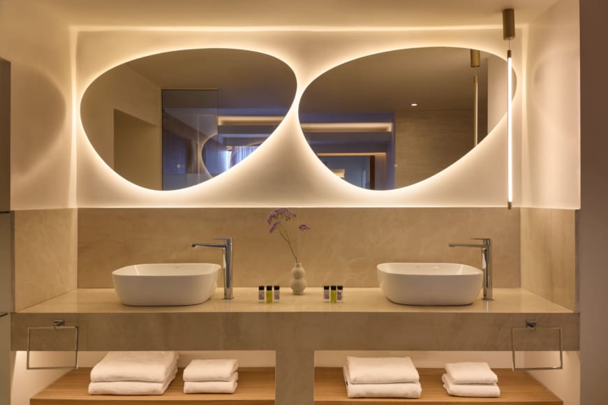 a bathroom with a large mirror