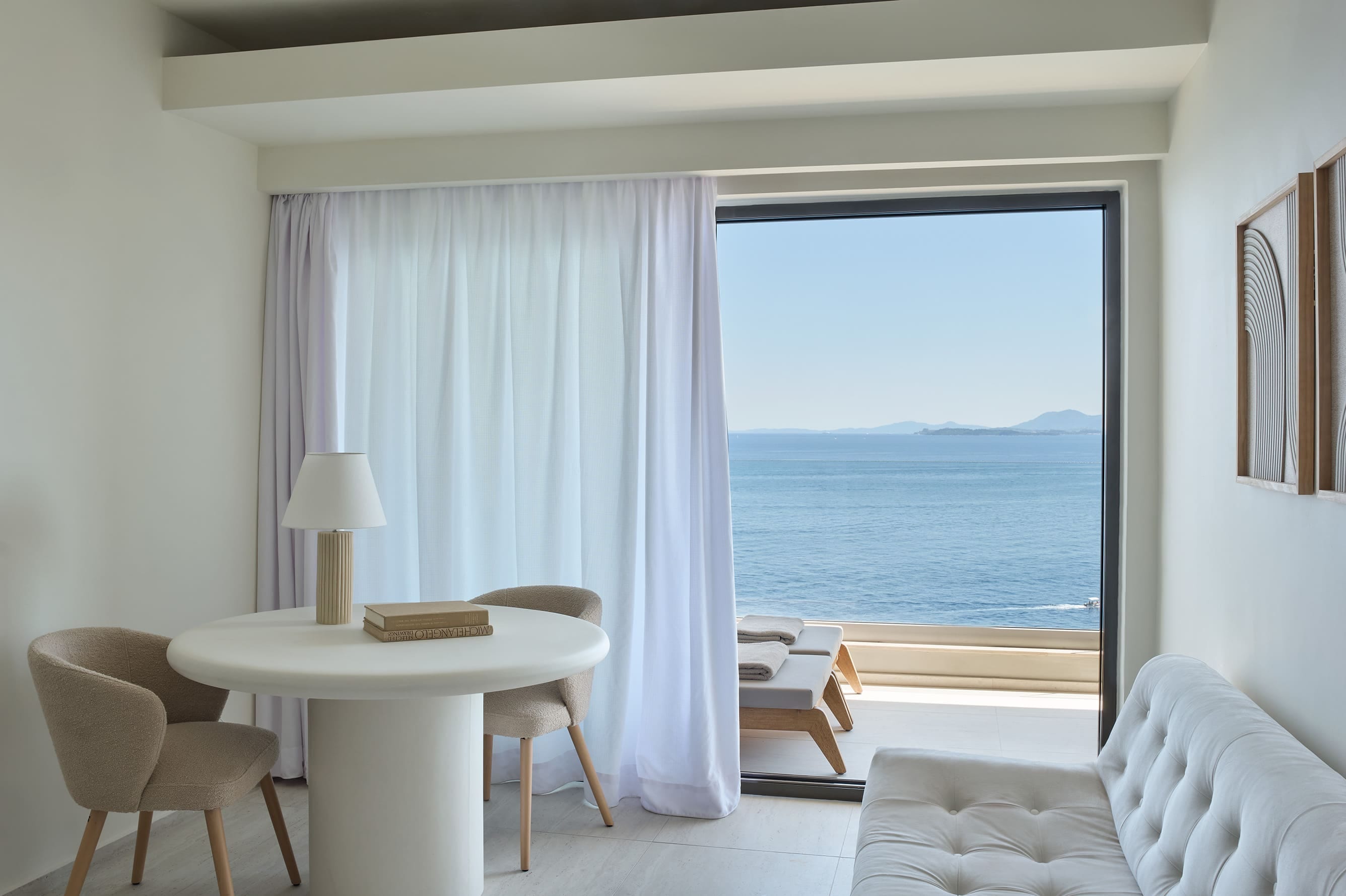 a room with a table and chairs