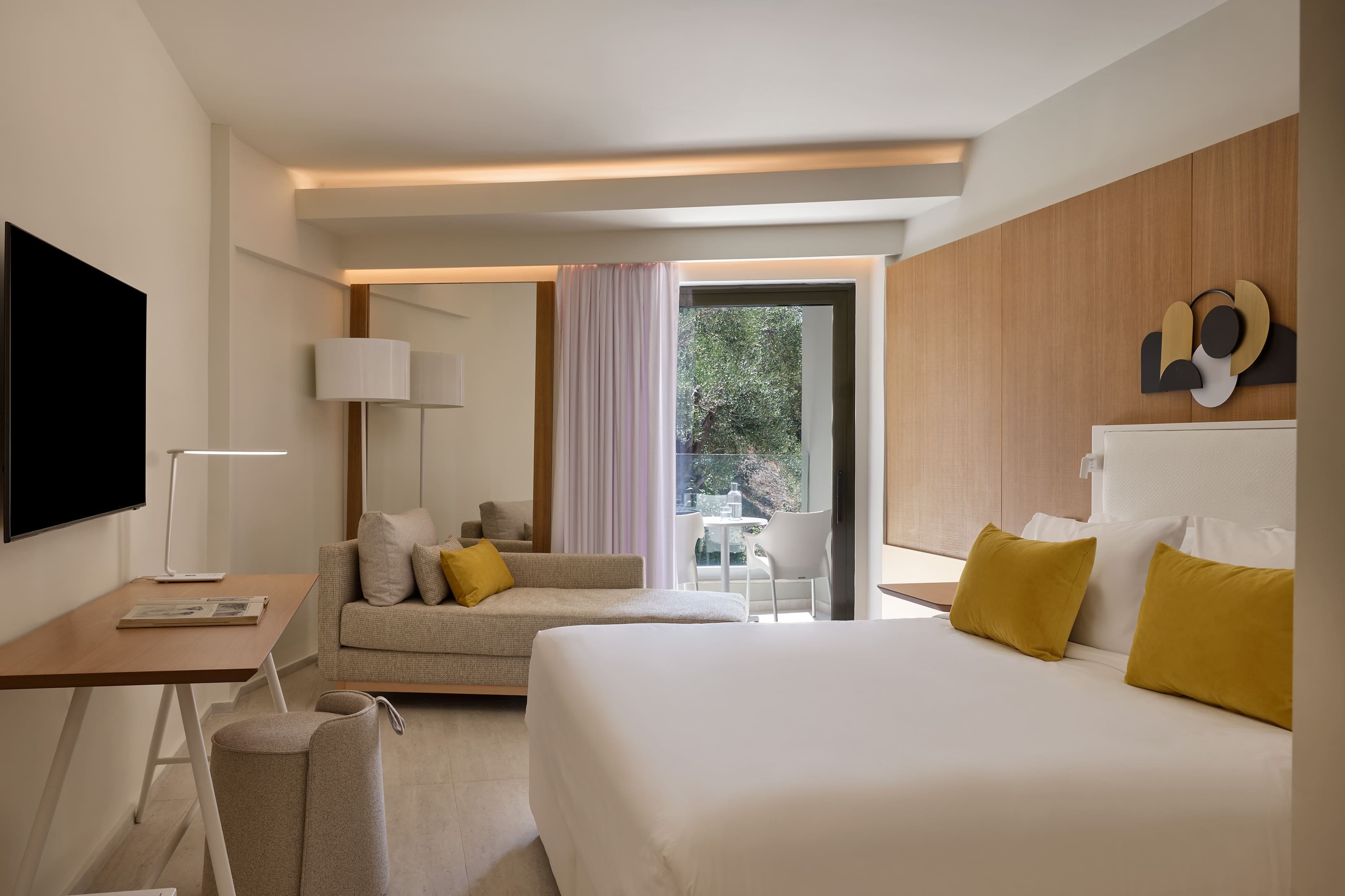 a bedroom with a large window