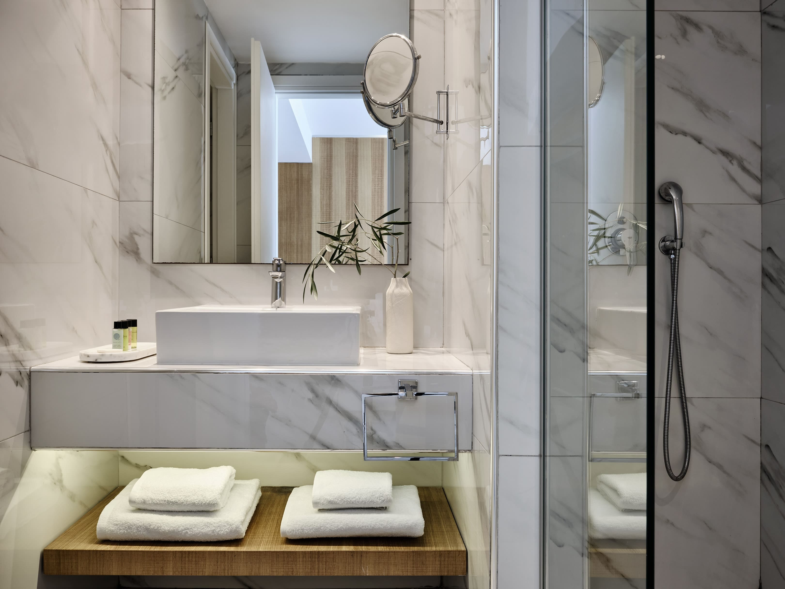 a bathroom with a glass shower