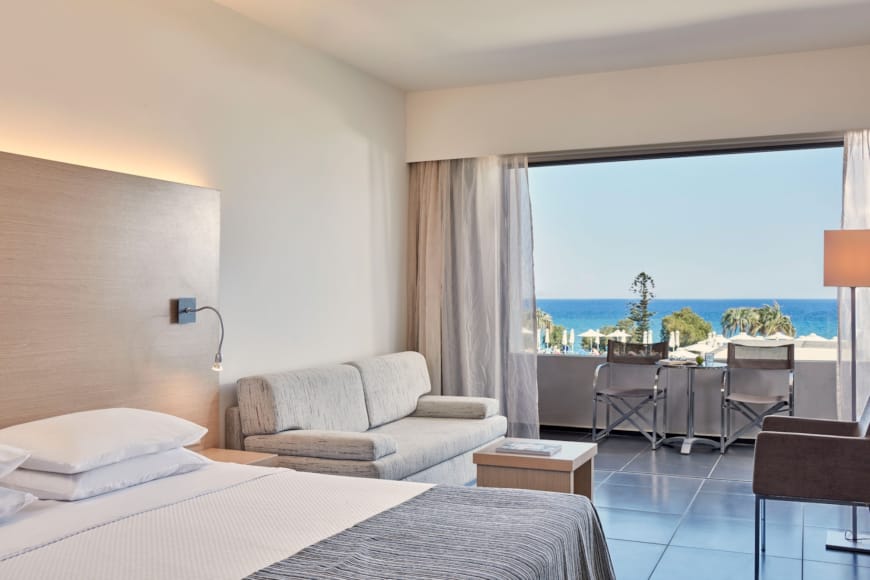 a hotel room with a large window