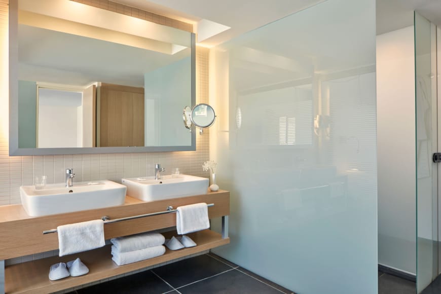 a bathroom with a large mirror